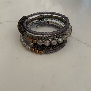 Pretty coiled bead bracelet in copper, plums/gray and mocha brown. NWOT.